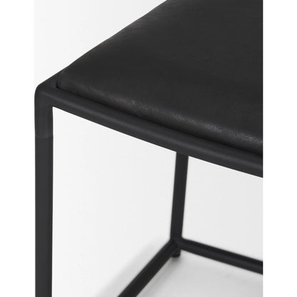 Taniel Leather Stool by Mercana. Made from leather in a traditional style.