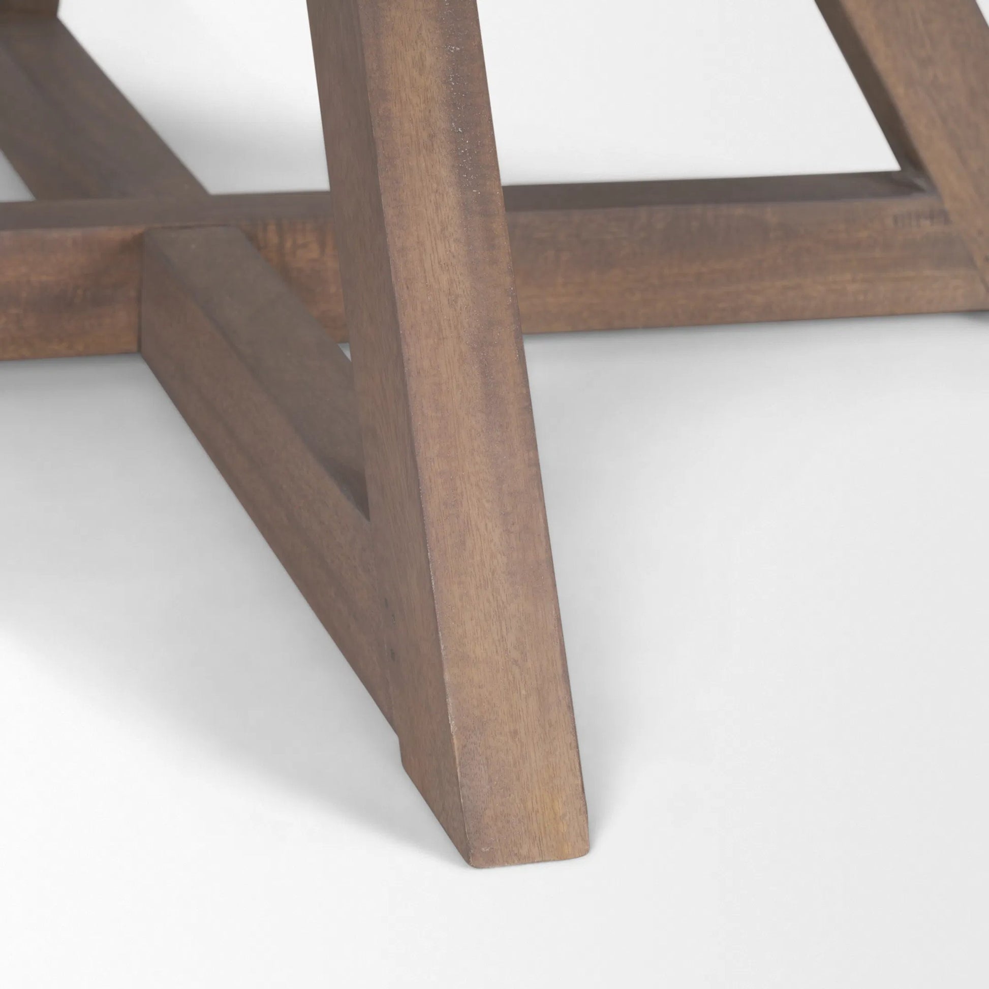 Jennings Dining Table by Mercana in brown. Made from solid wood in a modern style.