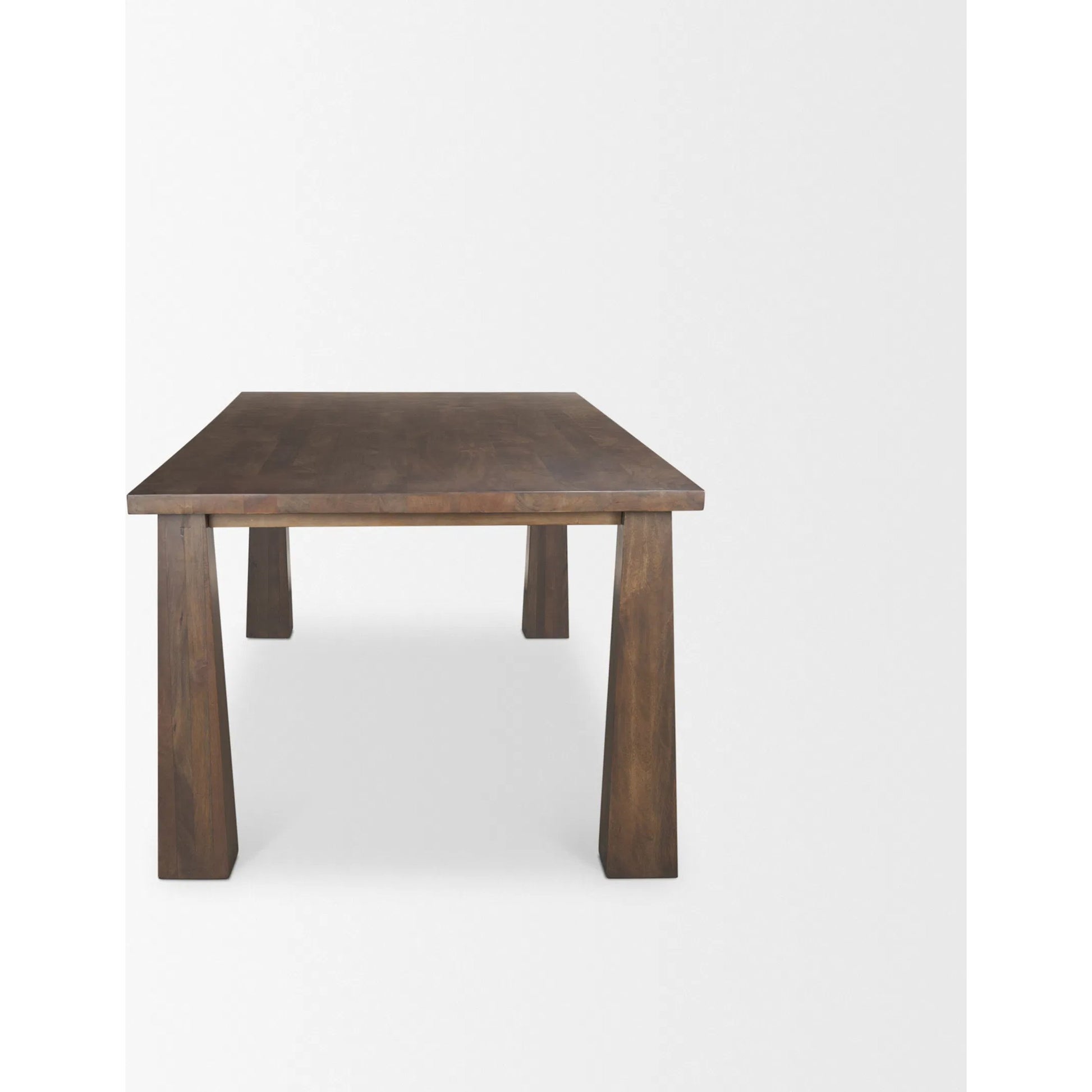 Wolcott Dining Table by Mercana in brown. Made from solid wood in a unique style.