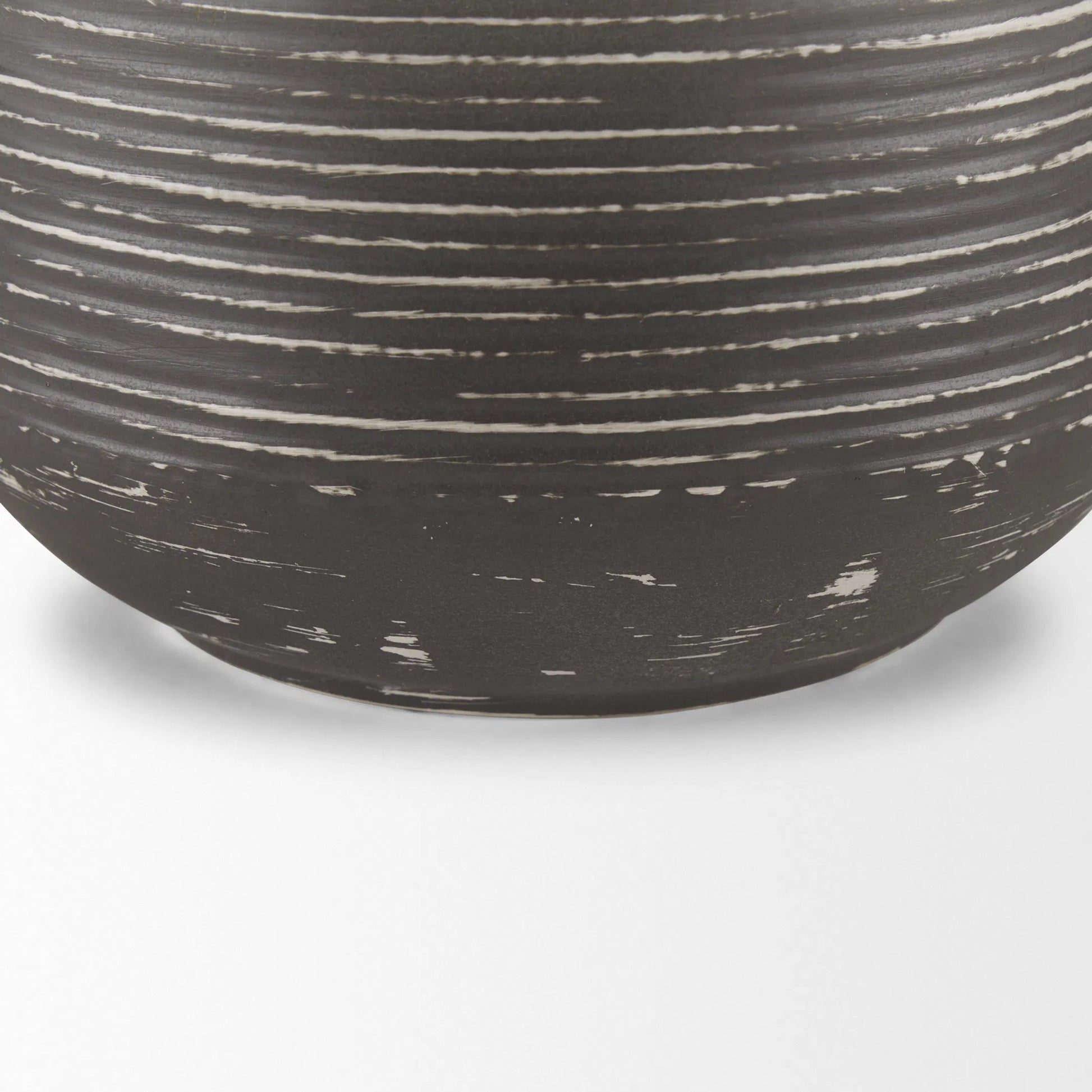 Toru Vase by Mercana in gray, white. Made from metal in a modern style.