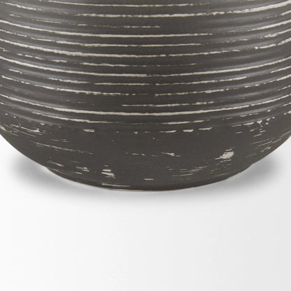 Toru Vase by Mercana in gray, white. Made from metal in a modern style.
