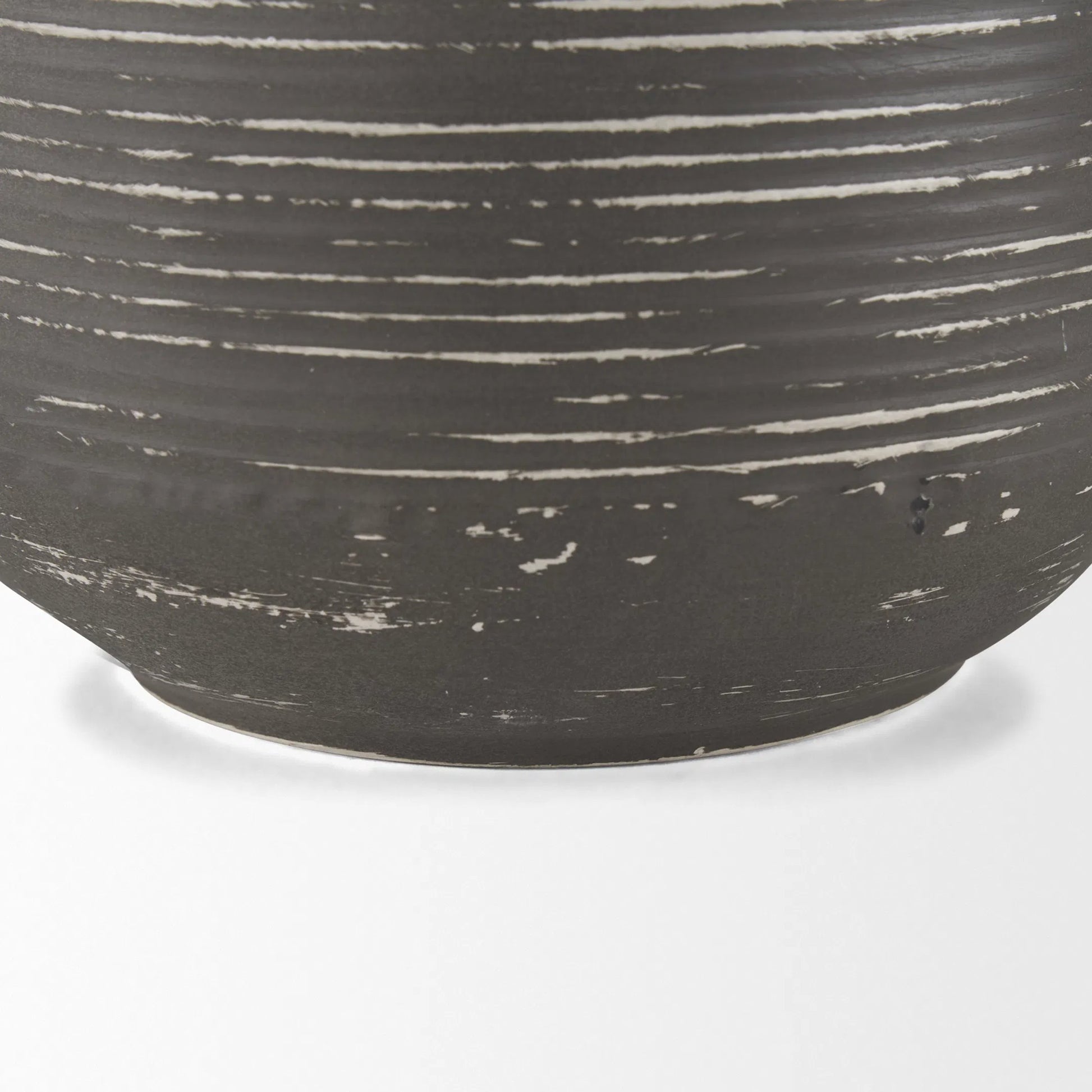 Toru Vase by Mercana in gray, white. Made from metal in a modern style.