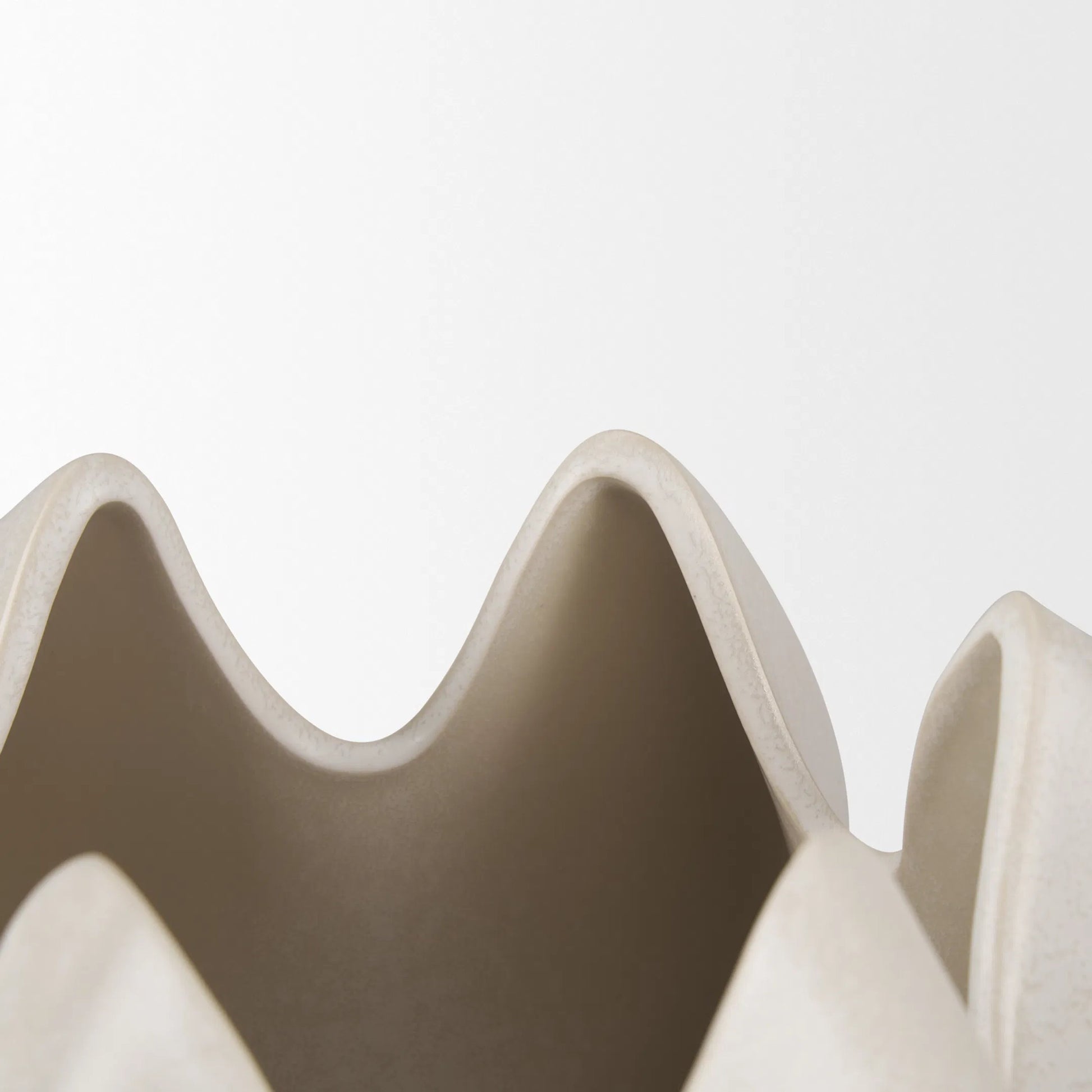 Ulrich Sculptural Vase by Mercana in cream. Made from ceramic in a modern style.
