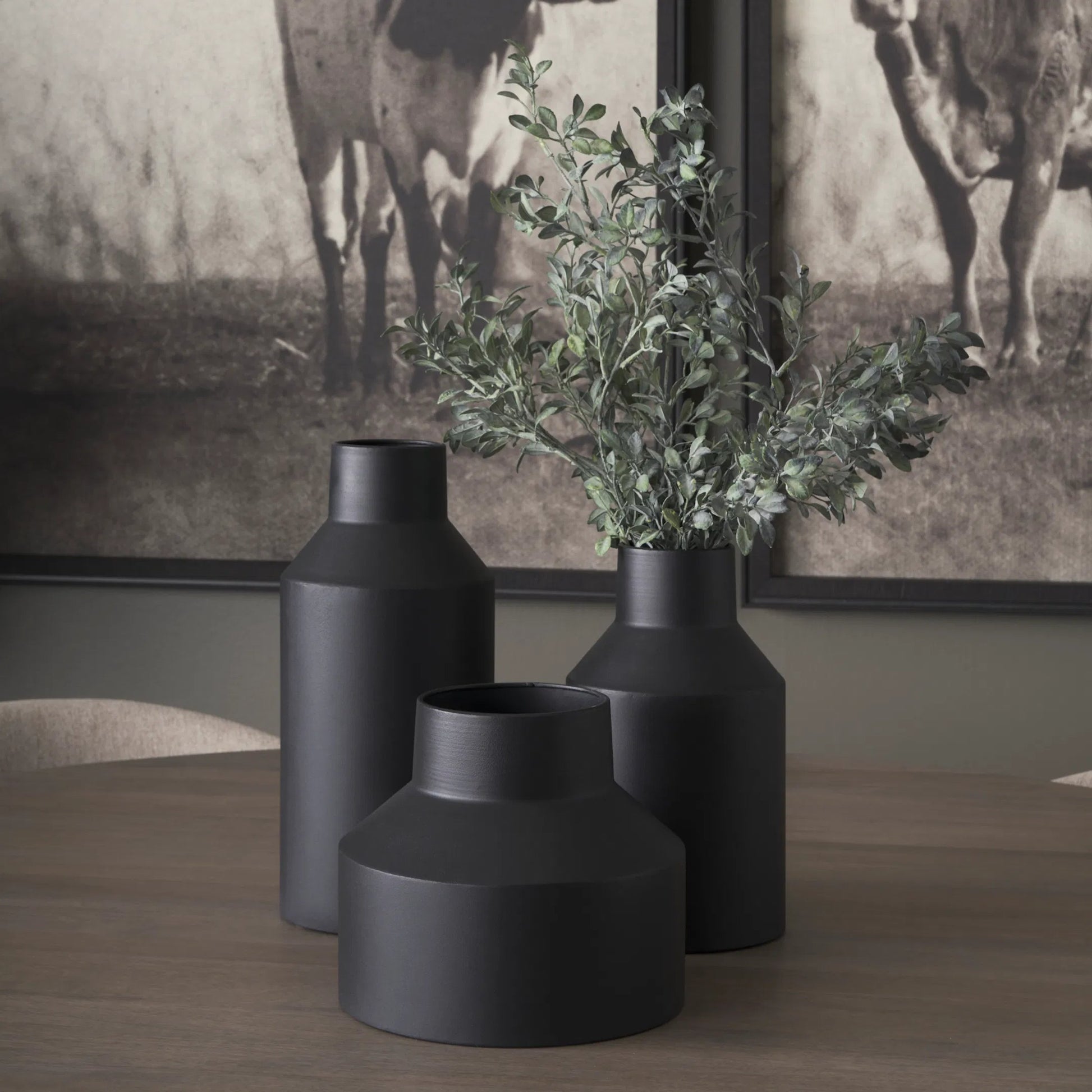 Tosca Vase by Mercana in black. Made from metal in a modern style.