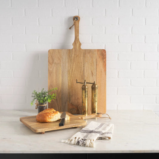 Khana Serving Boards by Mercana in brown. Made from solid wood in a unique style.