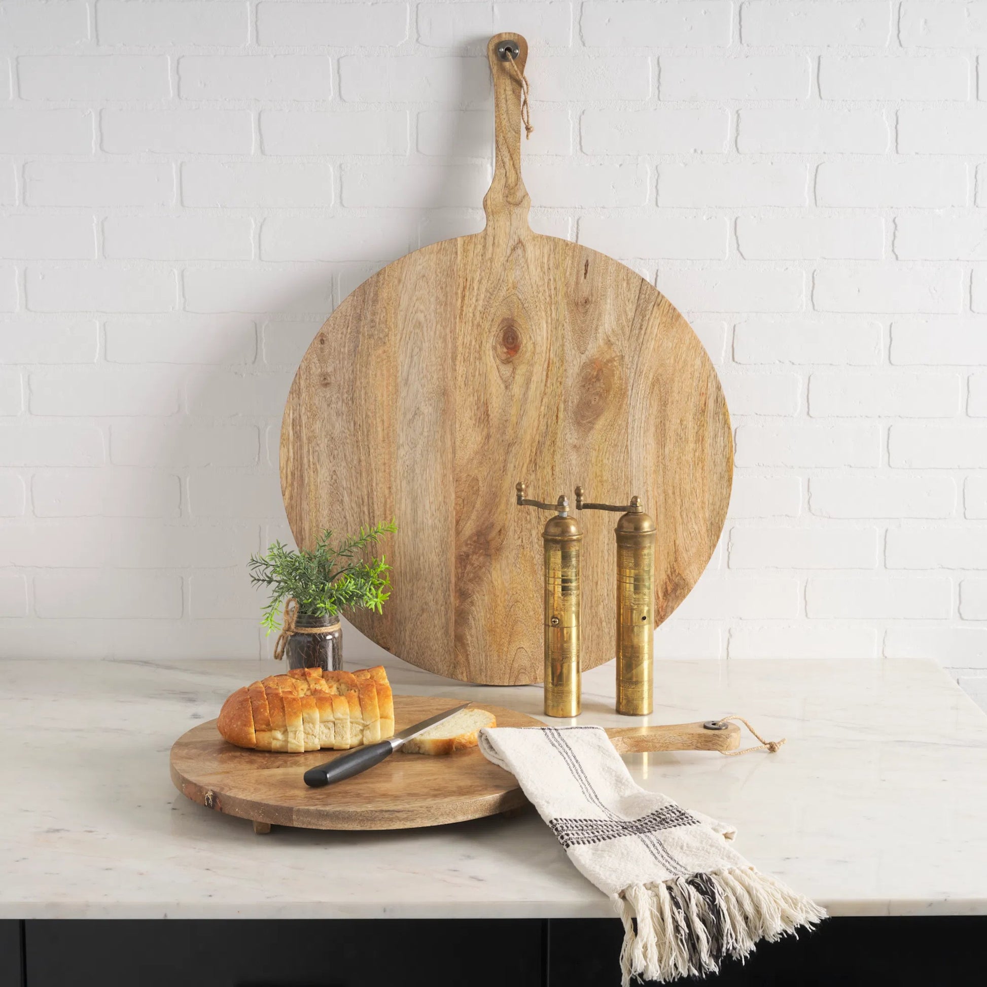 Karana Serving Boards by Mercana in brown. Made from solid wood in a cottage & farmhouse style.