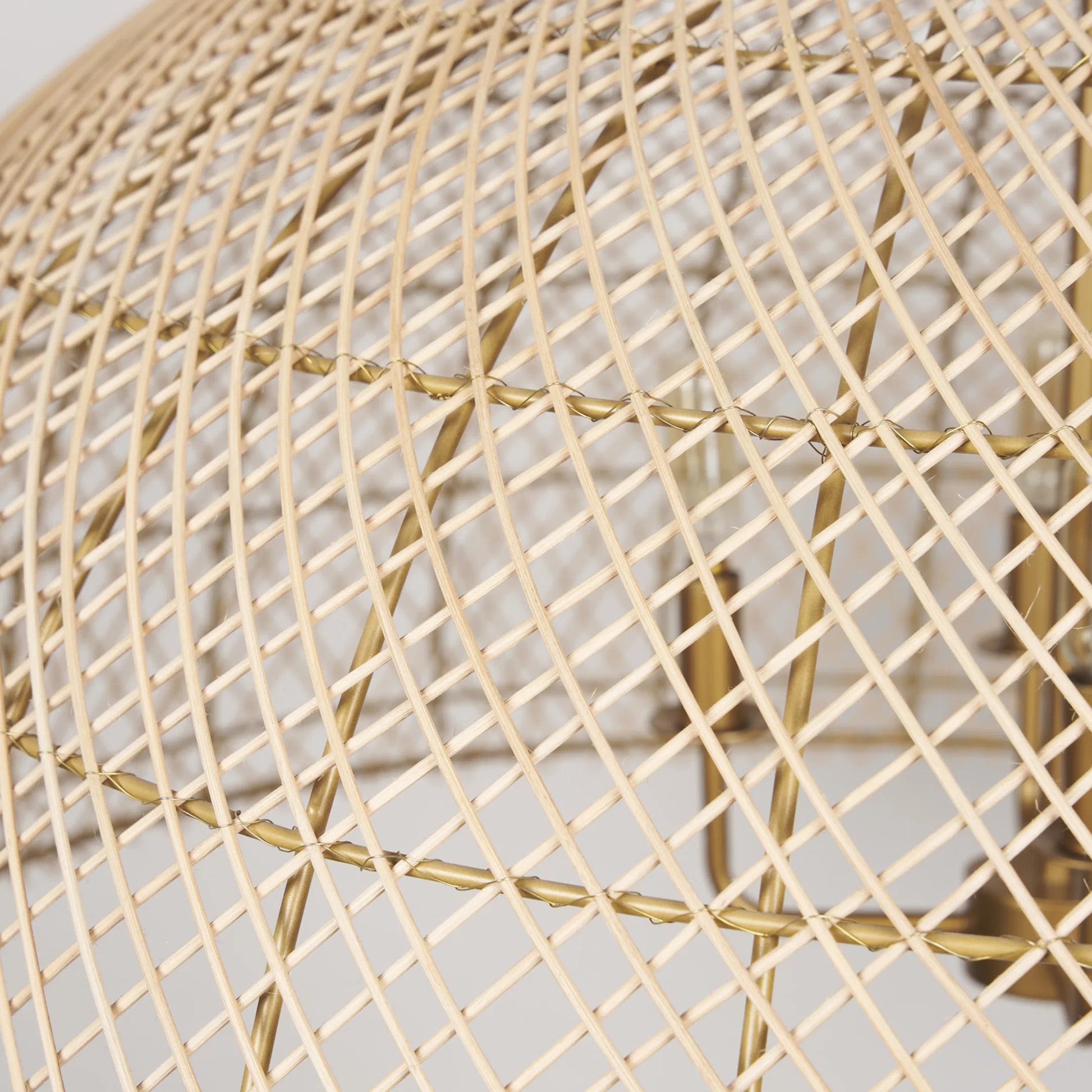 Thad 4-Light Natural Woven Rattan Dome Chandelier by Mercana in gold. Made from metal in a rustic style.