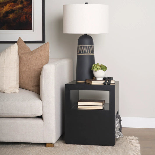 Vondra Accent Table by Mercana in black. Made from metal in a unique style.
