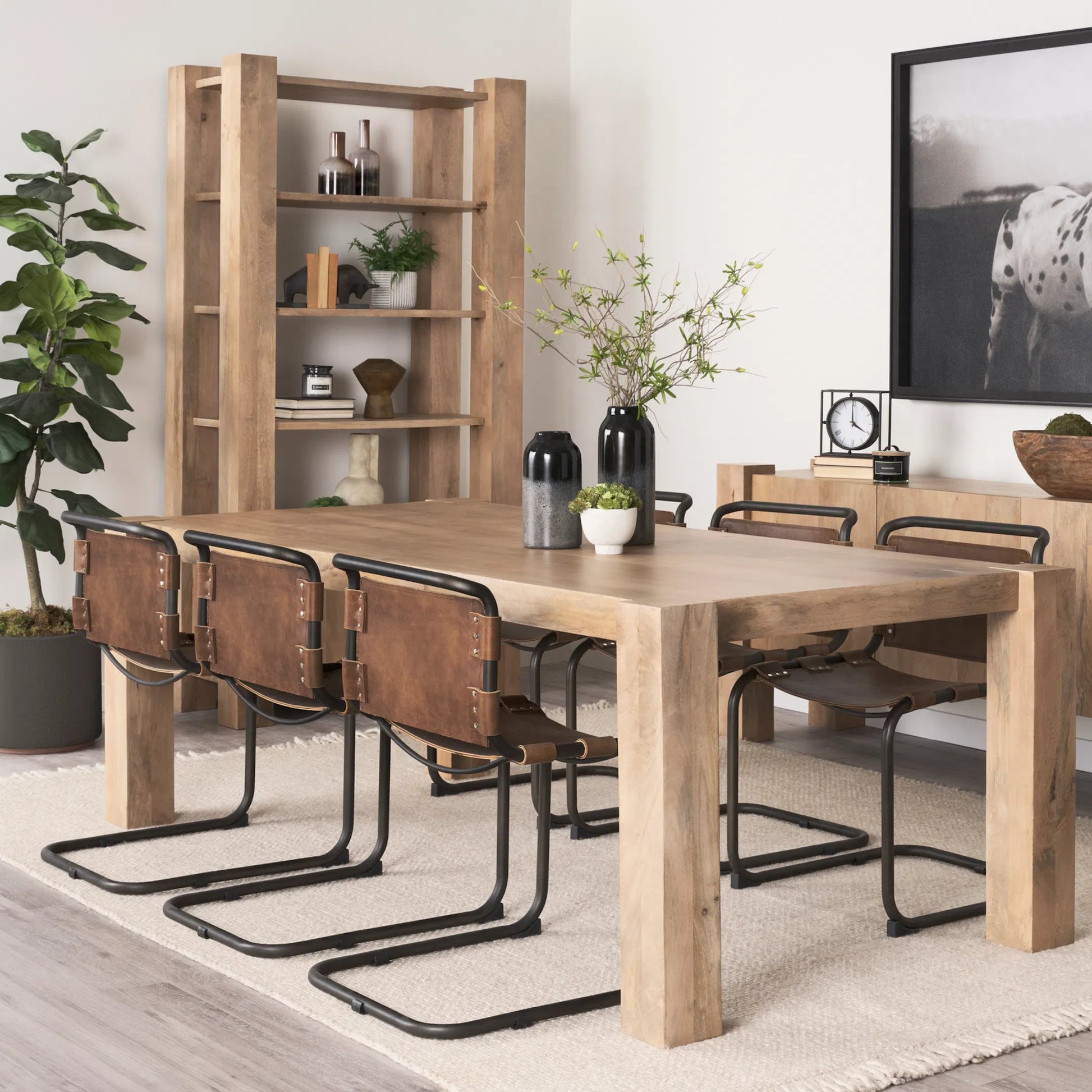 Berbick Dining Chair by Mercana. Made from leather, iron in a unique style.