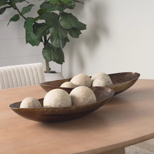Karmen Hammered Oversized Bowls Set of Two by Mercana in gold. Made from unique in a unique style.