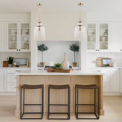 Sadah Pendant Light by Mercana in brushed brass. Made from glass in a transitional style.