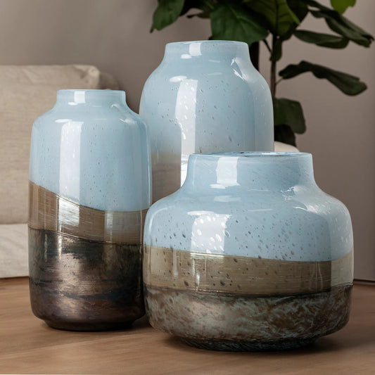 Nasser I Urn Style Vase by Mercana in antique gold. Made from glass in a coastal style.