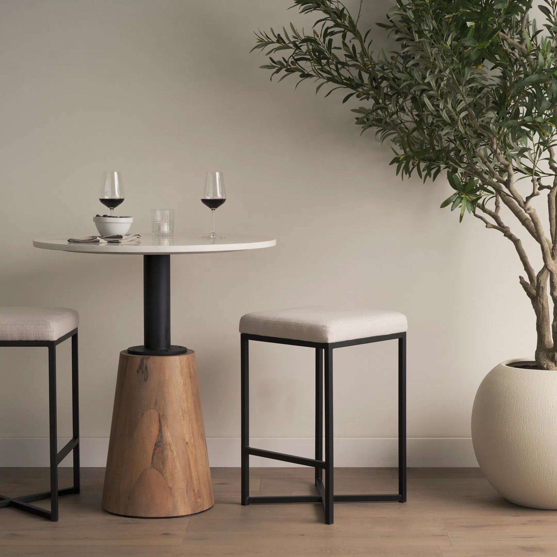 Frodo Upholstered Seat Bar/Counter Stool by Mercana in white. Made from unique in a modern style.