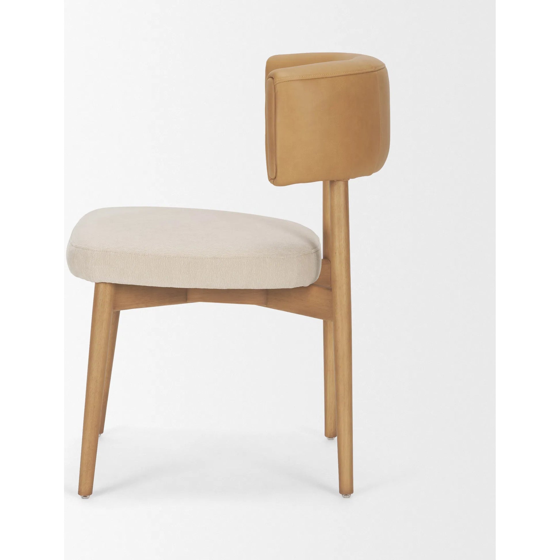 Motley Curve Leather Dining Chair (Set of 2) by Mercana in cream, brown. Made from solid wood in a transitional style.