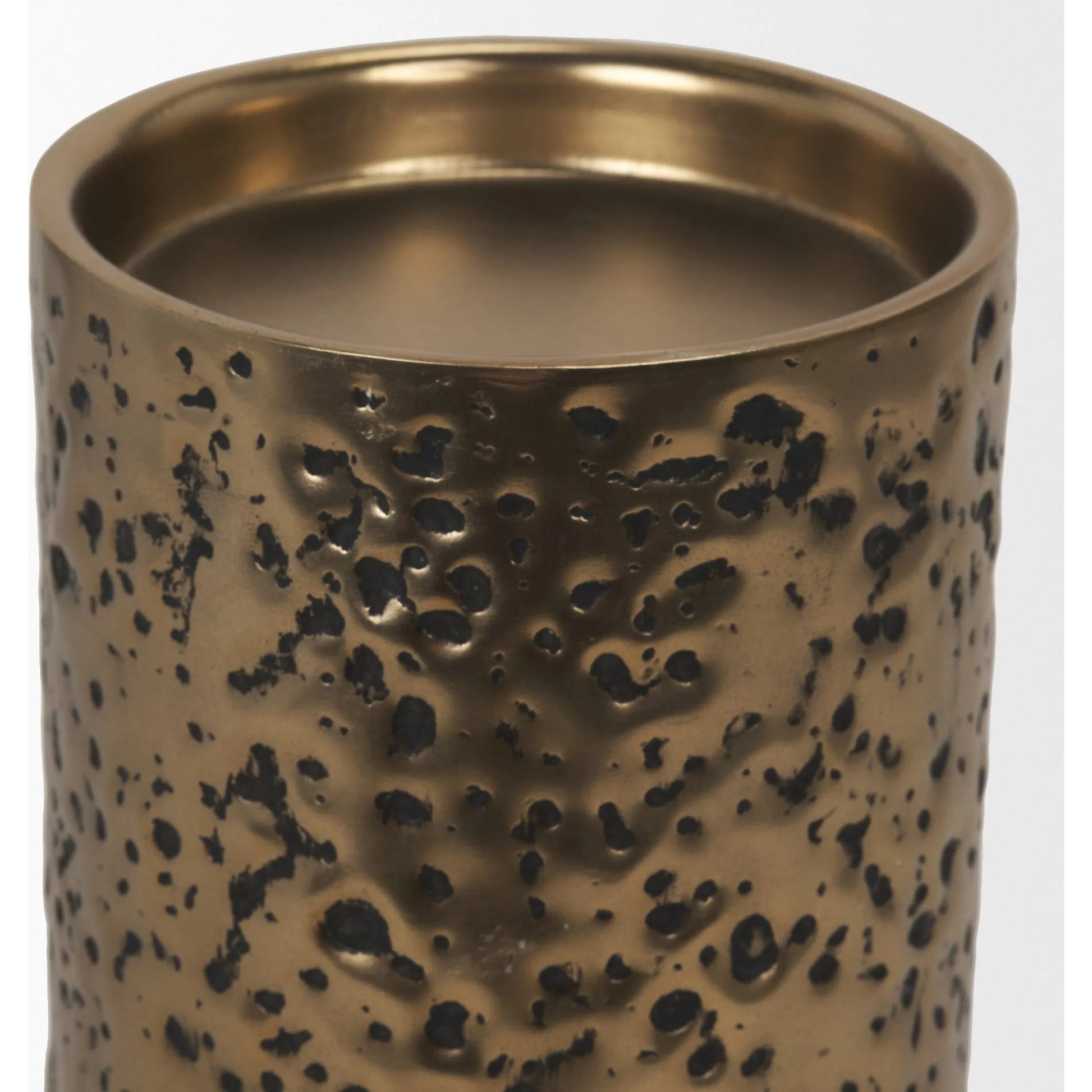 Akira Hammered Gold Pillar Candle Holder by Mercana in antiqued gold. Made from metal in a rustic style.