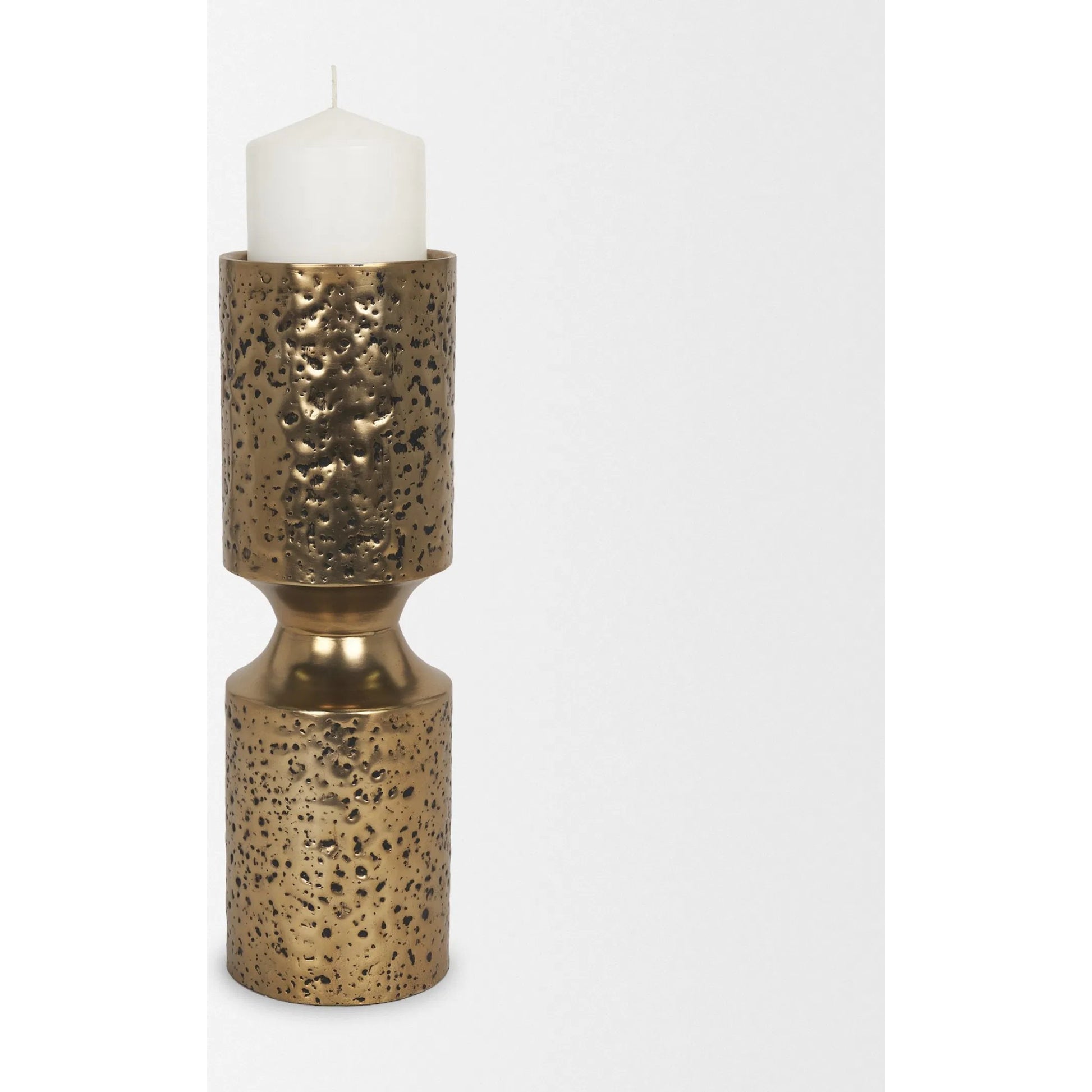 Akira Hammered Gold Pillar Candle Holder by Mercana in antiqued gold. Made from metal in a rustic style.