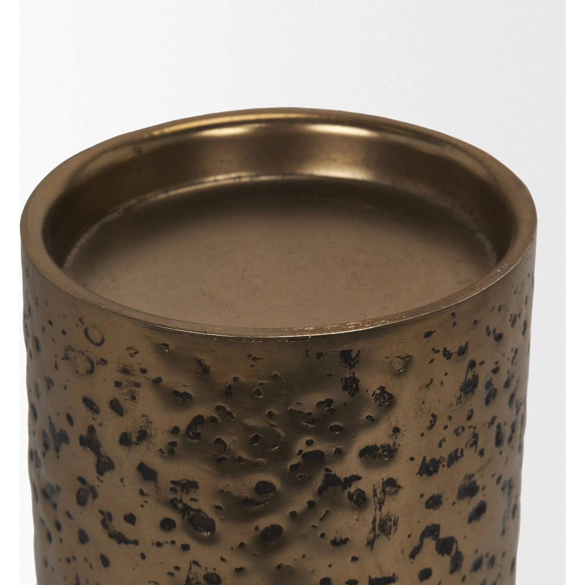 Akira Hammered Gold Pillar Candle Holder by Mercana in antiqued gold. Made from metal in a rustic style.