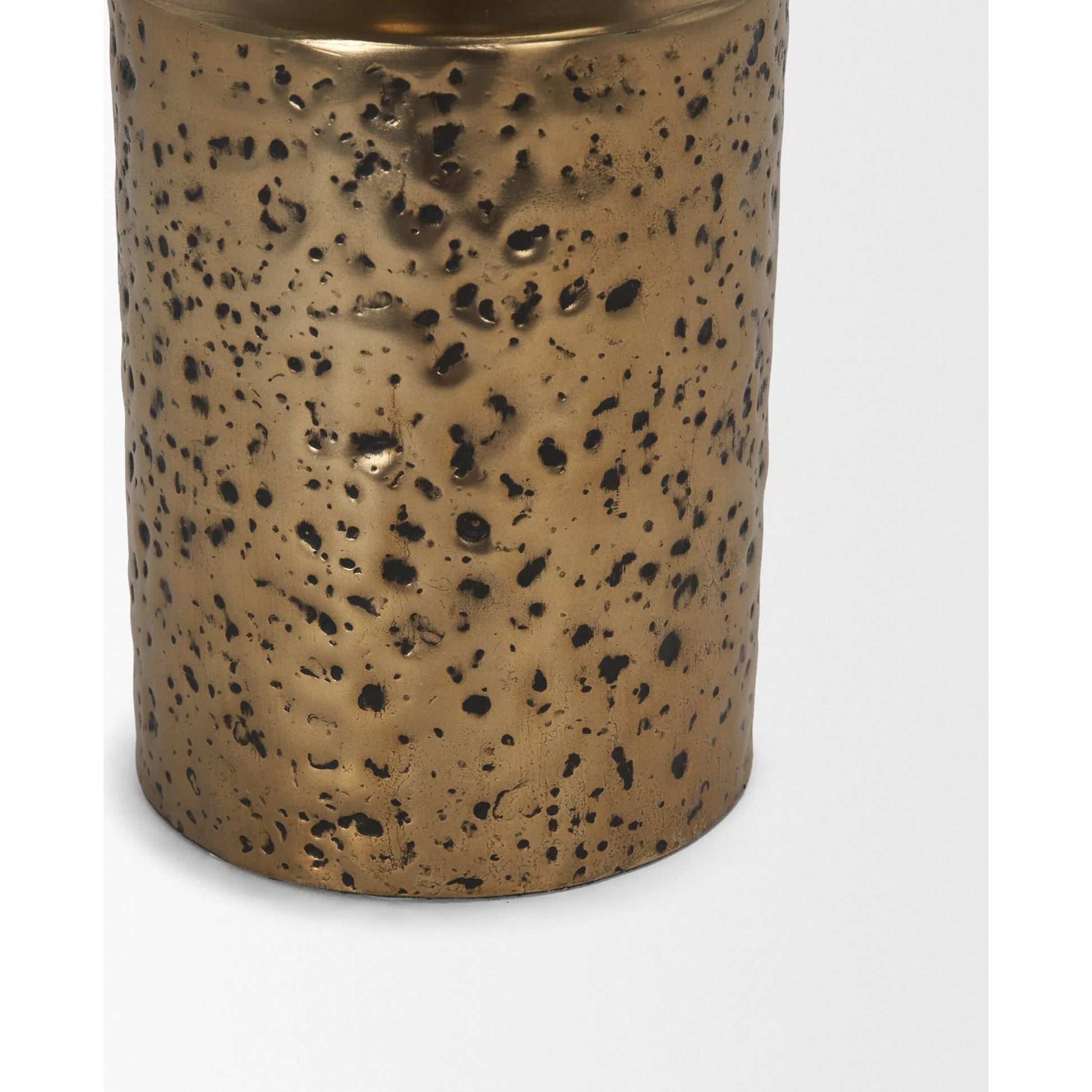 Akira Hammered Gold Pillar Candle Holder by Mercana in antiqued gold. Made from metal in a rustic style.