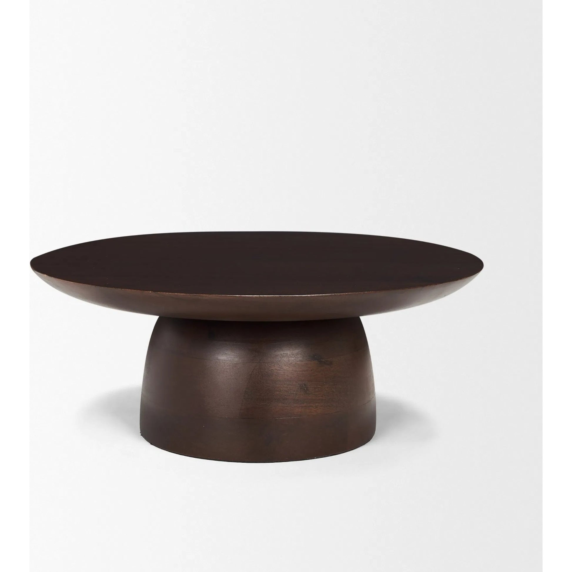 Sadira Mid-Dark Brown Round Riser by Mercana in medium brown. Made from solid wood in a unique style.