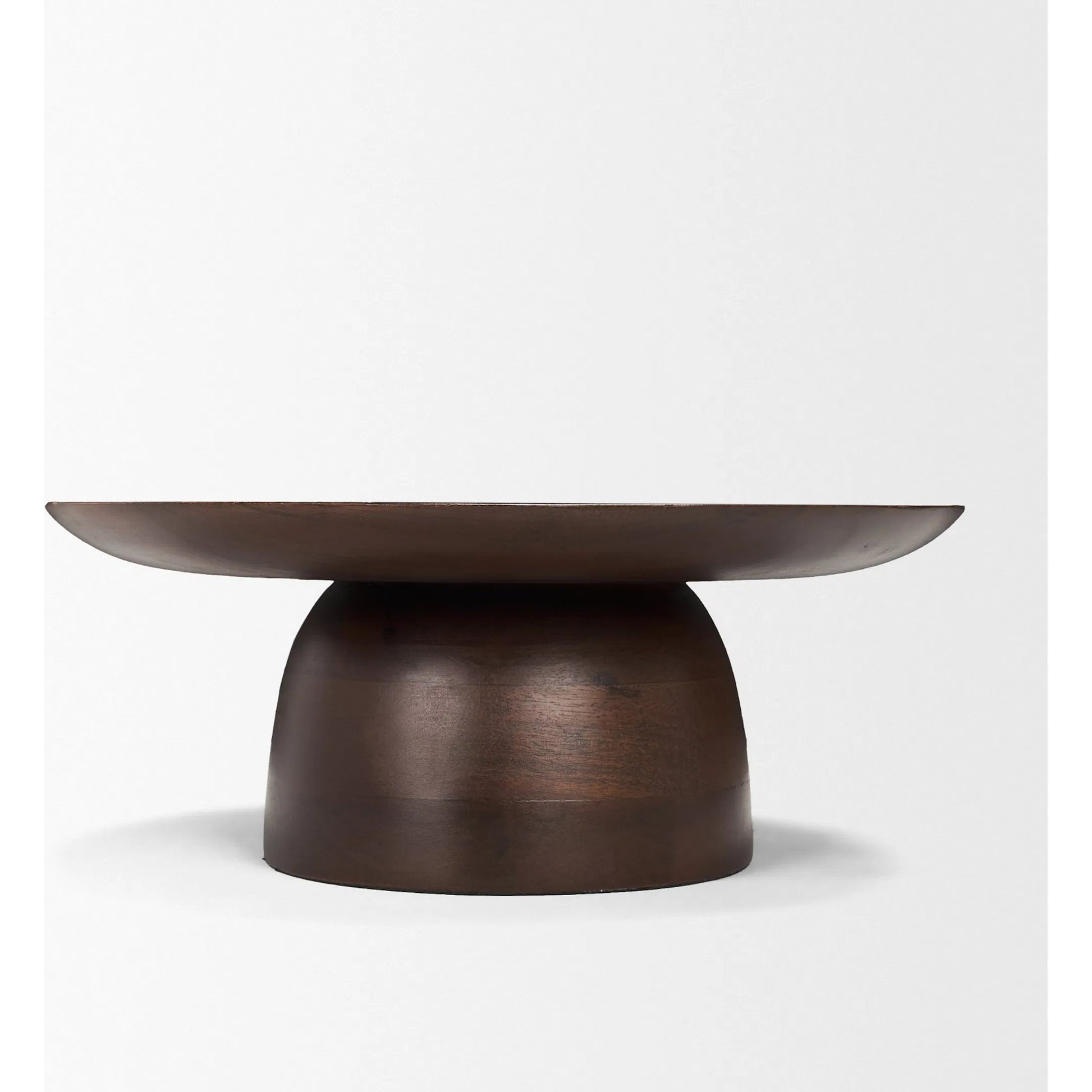 Sadira Mid-Dark Brown Round Riser by Mercana in medium brown. Made from solid wood in a unique style.