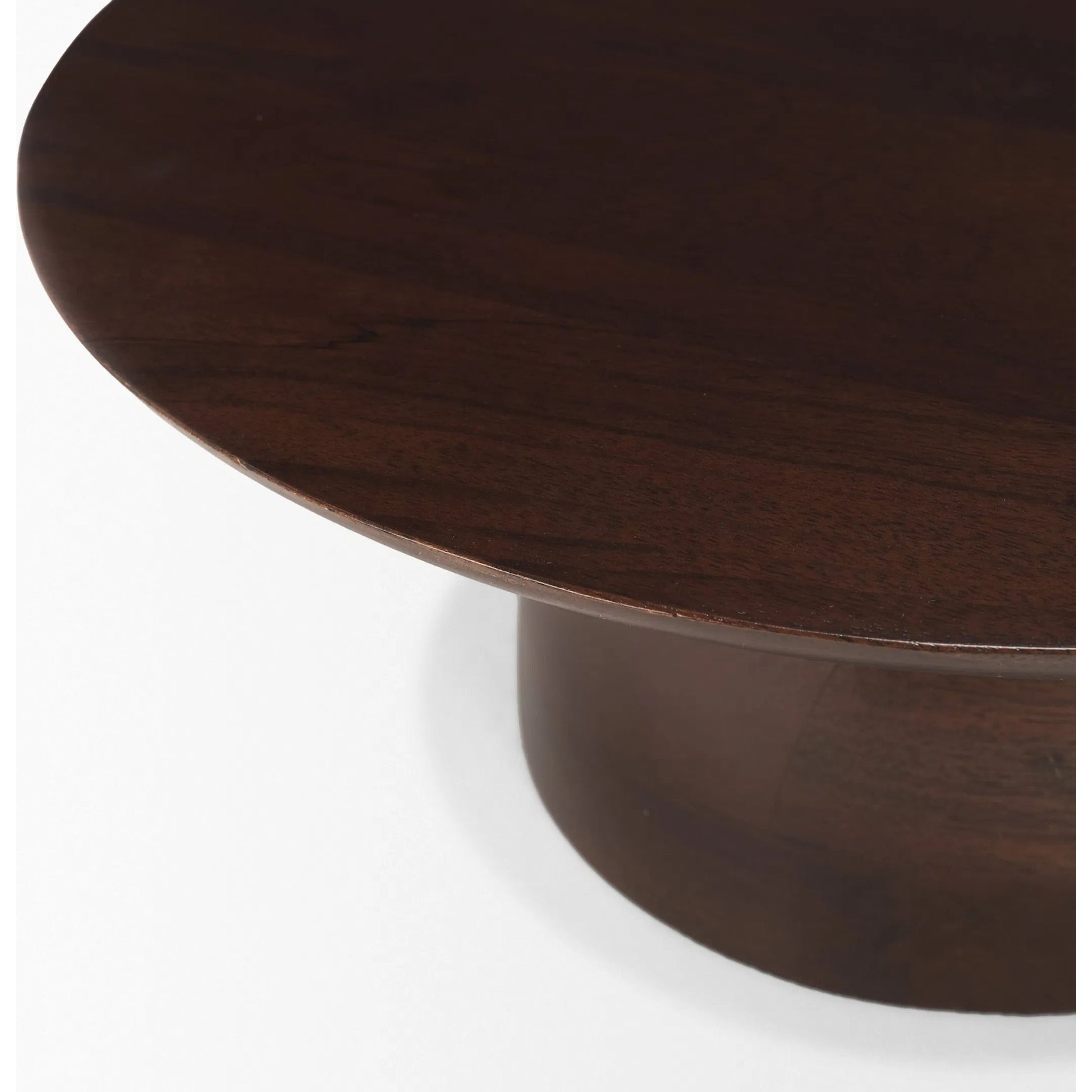 Sadira Mid-Dark Brown Round Riser by Mercana in medium brown. Made from solid wood in a unique style.
