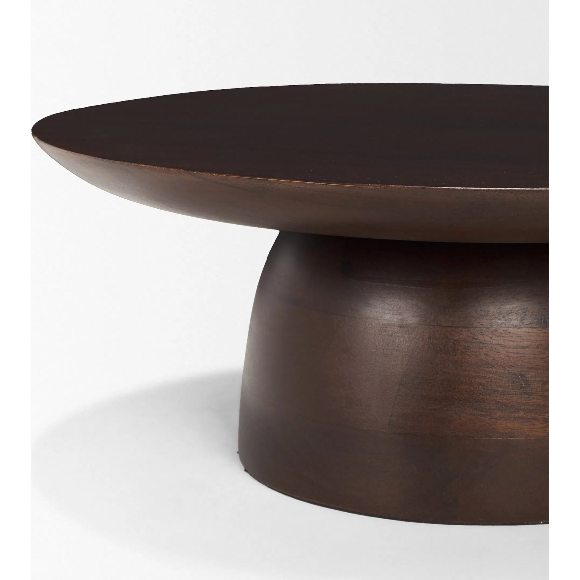 Sadira Mid-Dark Brown Round Riser by Mercana in medium brown. Made from solid wood in a unique style.
