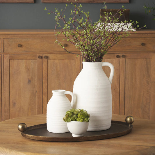 Jianna Oval Textured Antiqued Gold Tray with Handles by Mercana in antiqued gold. Made from metal in a unique style.