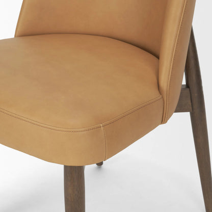 Abbie Curve Leather Dining Chair (Set of 2) by Mercana in tan, brown. Made from solid wood in a transitional style.