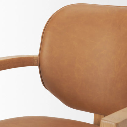 Carlisle Leather Dining Armchair by Mercana. Made from solid wood in a transitional style.