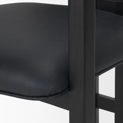 Carlisle Leather Dining Armchair by Mercana. Made from solid wood in a transitional style.