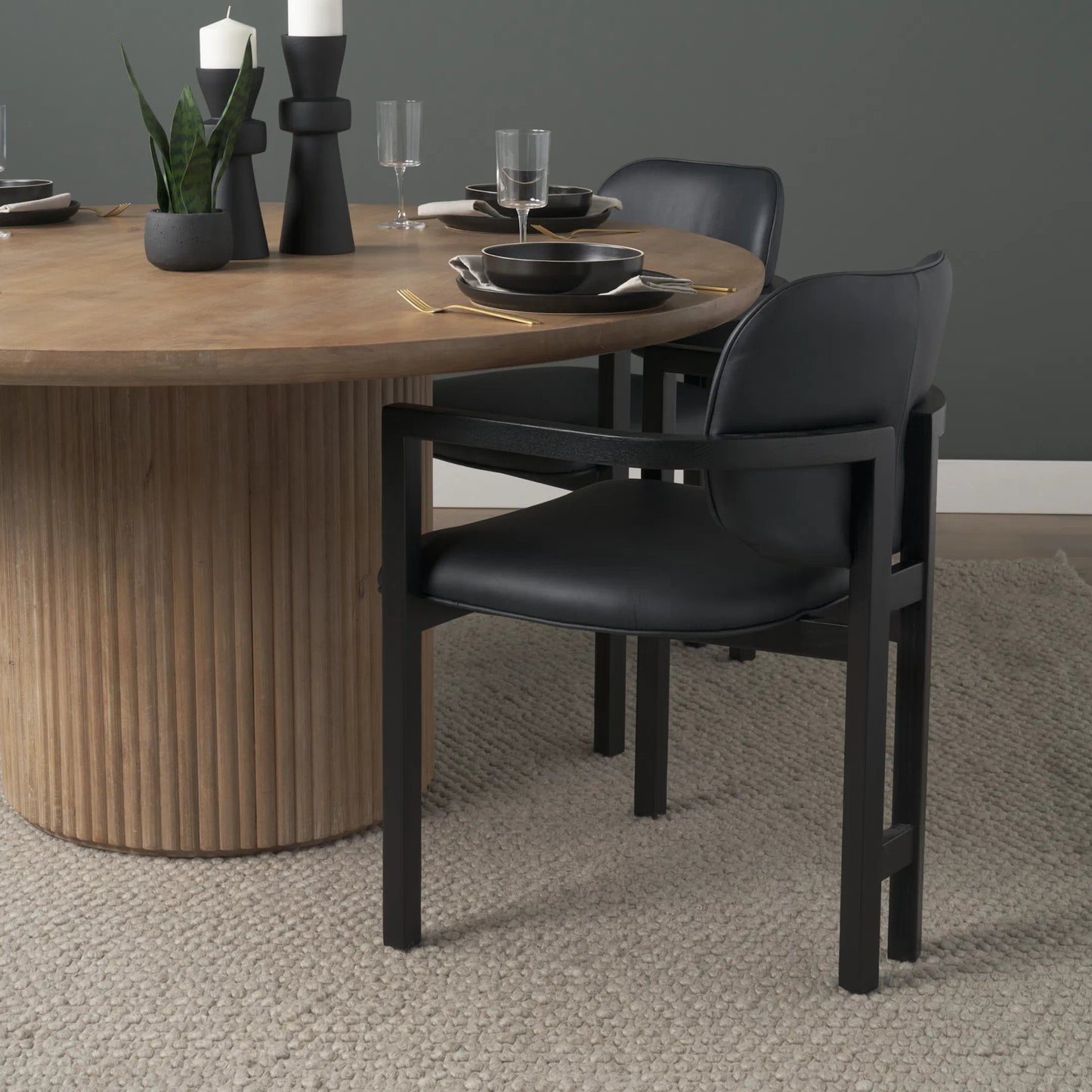 019 SI-2518307 | Lifestyle | Carlisle Leather Dining Armchair by Mercana. Made from solid wood in a transitional style.