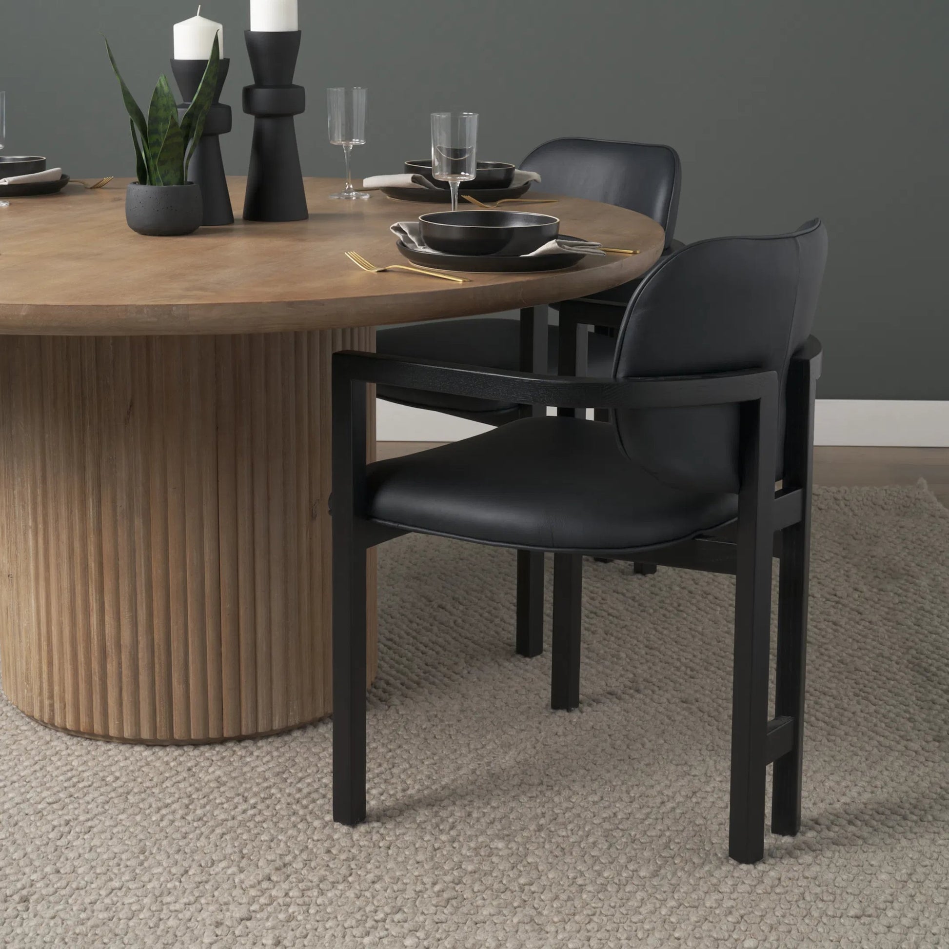 Carlisle Leather Dining Armchair by Mercana. Made from solid wood in a transitional style.