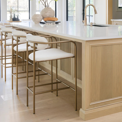 Parker Upholstered Seat Counter Stool by Mercana in beige. Made from metal in a unique style.