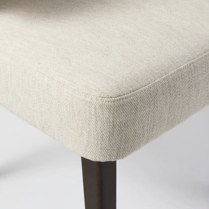 Niles Fabric Dining Chair by Mercana. Made from solid wood in a traditional style.