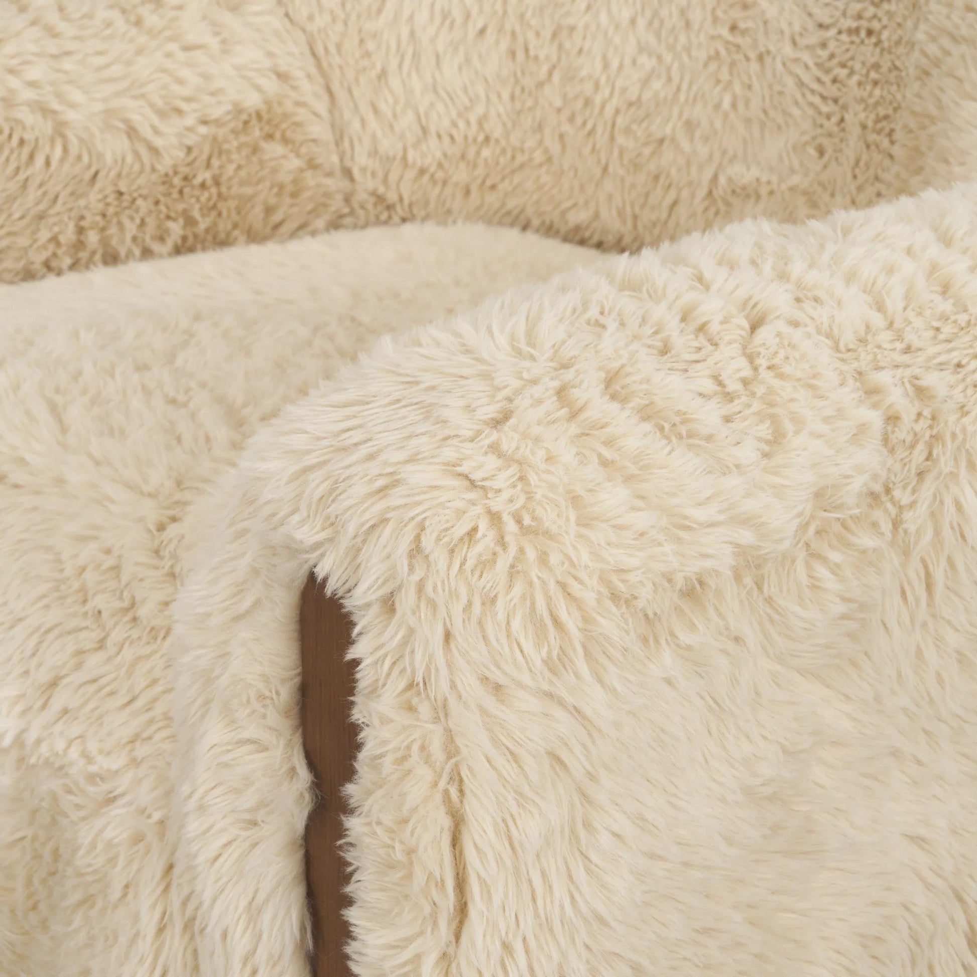Huntley Accent Chair by Mercana in cream. Made from polyester in a unique style.