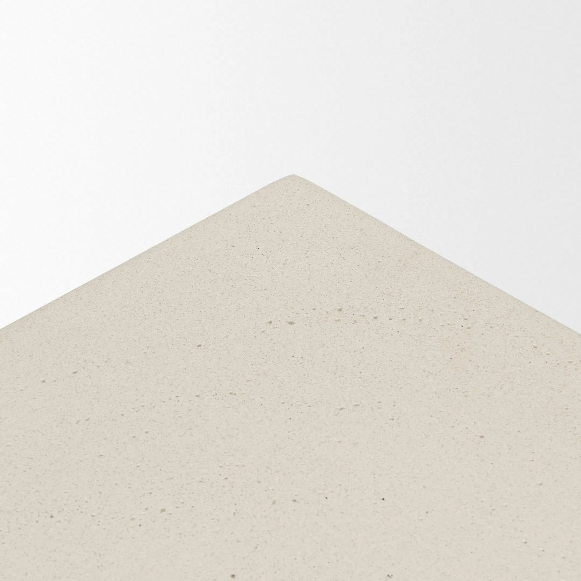 Bunda Accent Table by Mercana in ivory. Made from stone in a unique style.