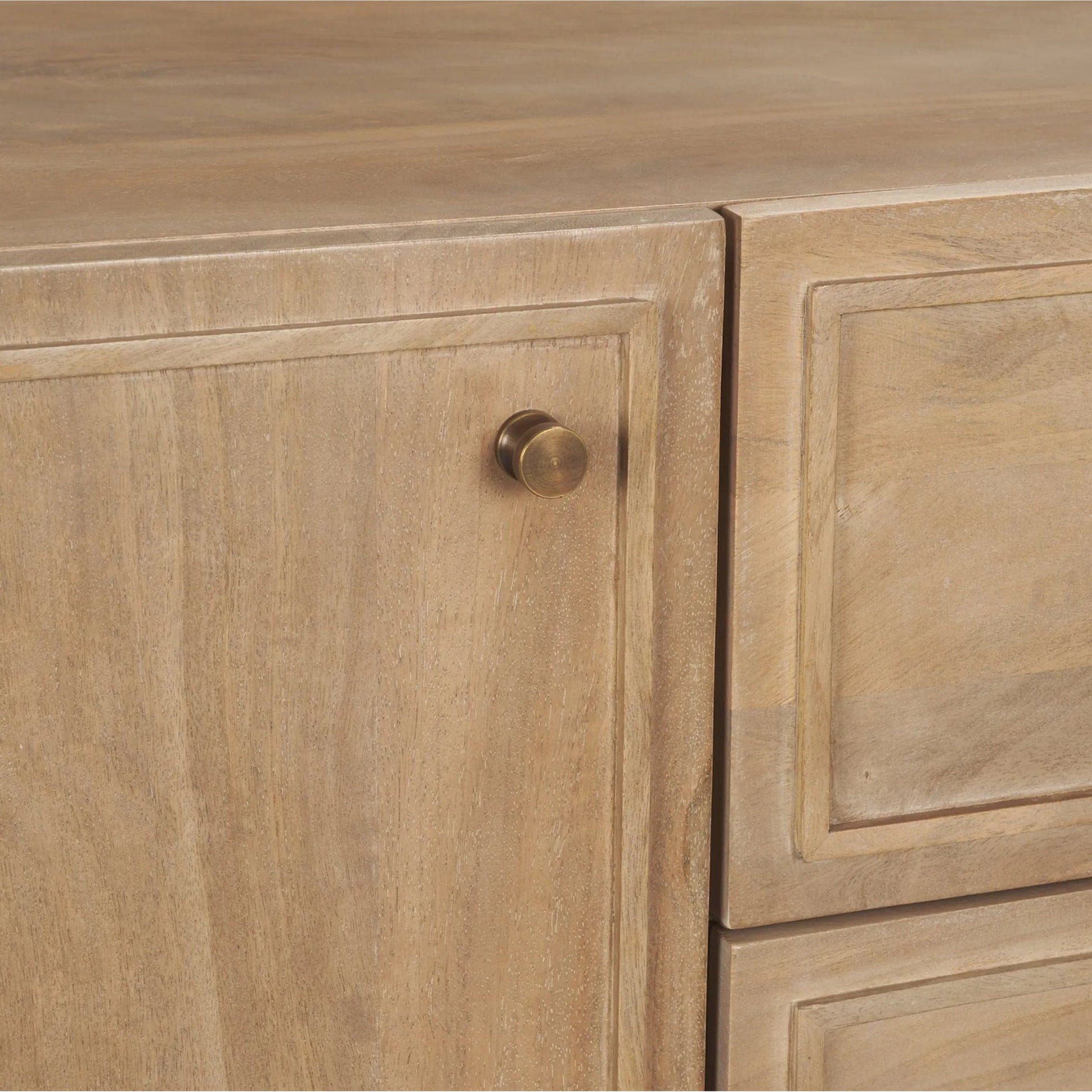 Phil Sideboard by Mercana in light brown. Made from solid wood in a unique style.