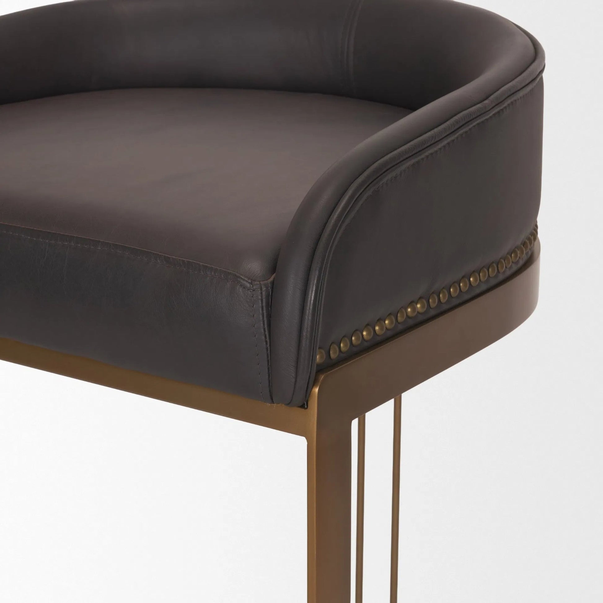 Hollyfield Leather Bar Stool by Mercana in dark brown. Made from metal in a unique style.