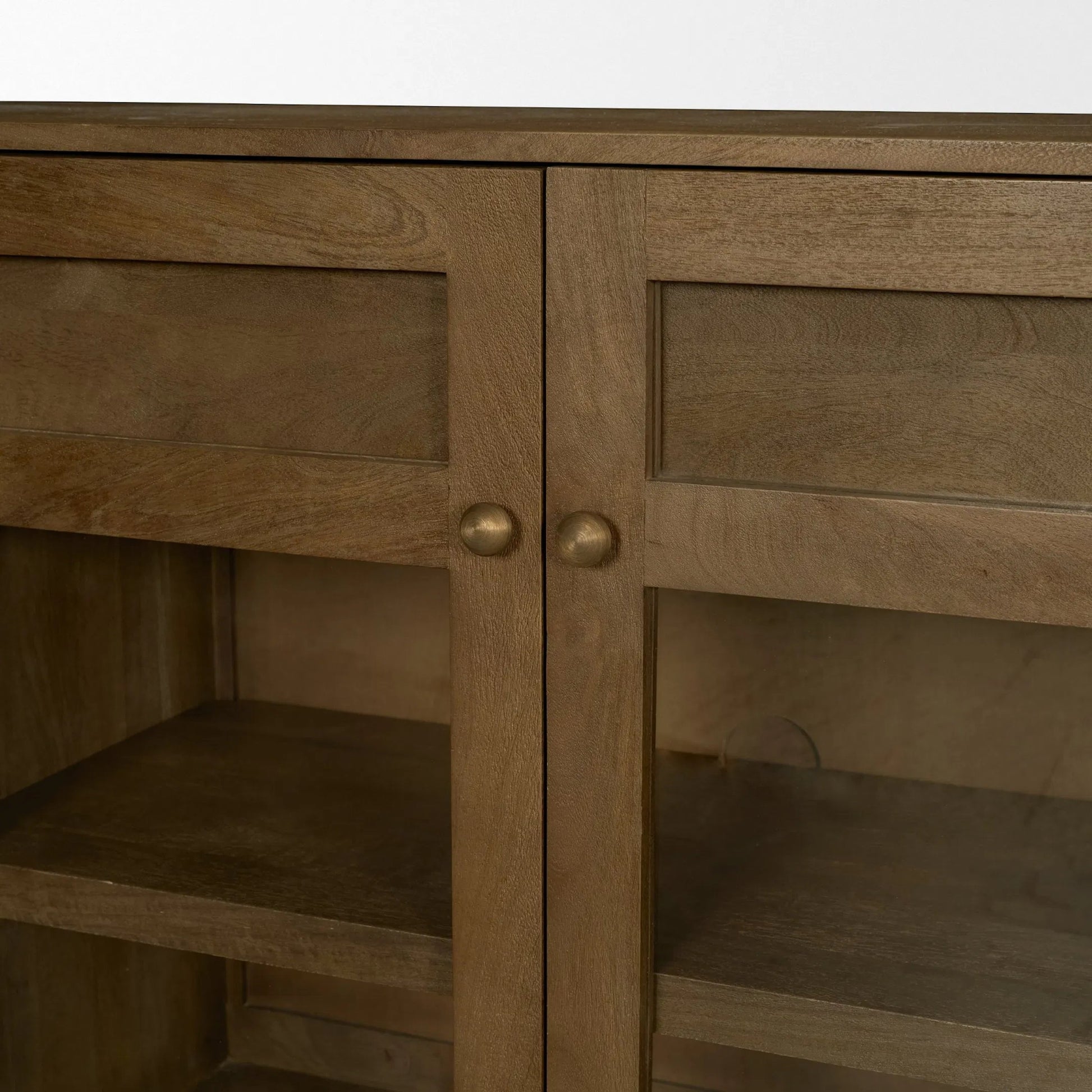 Suri Sideboard by Mercana in light brown. Made from solid wood in a transitional style.