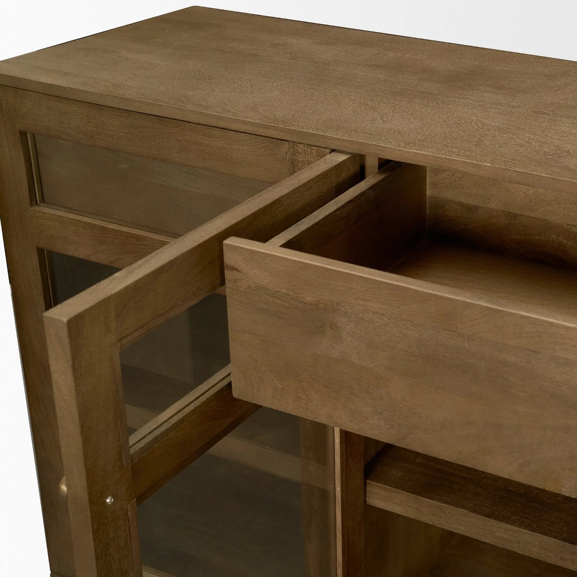 Suri Sideboard by Mercana in light brown. Made from solid wood in a transitional style.