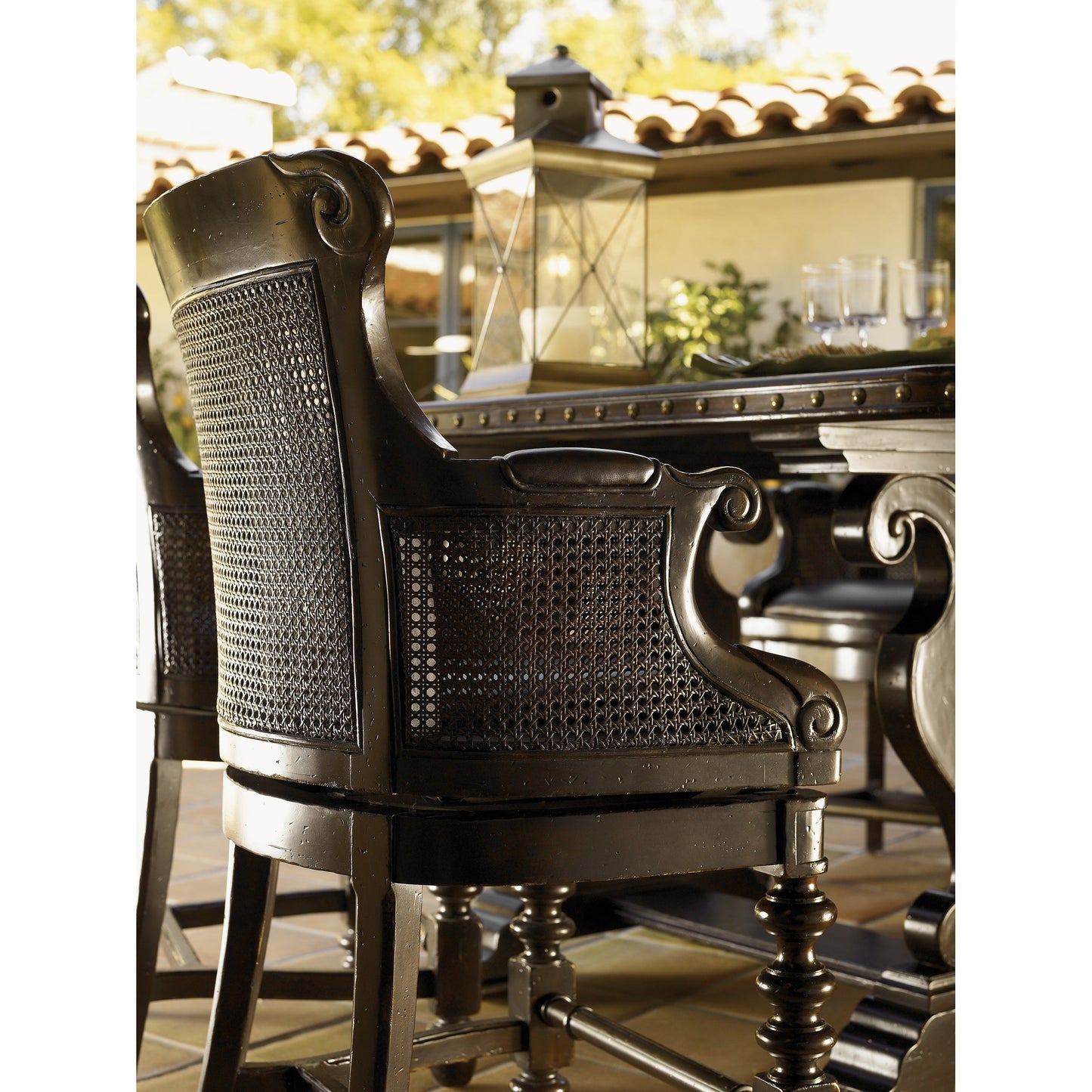 002 SR-836081 | Lifestyle | Dunkirk Swivel Counter Stool by Tommy Bahama Home in mocha. Made from unique in a traditional style.