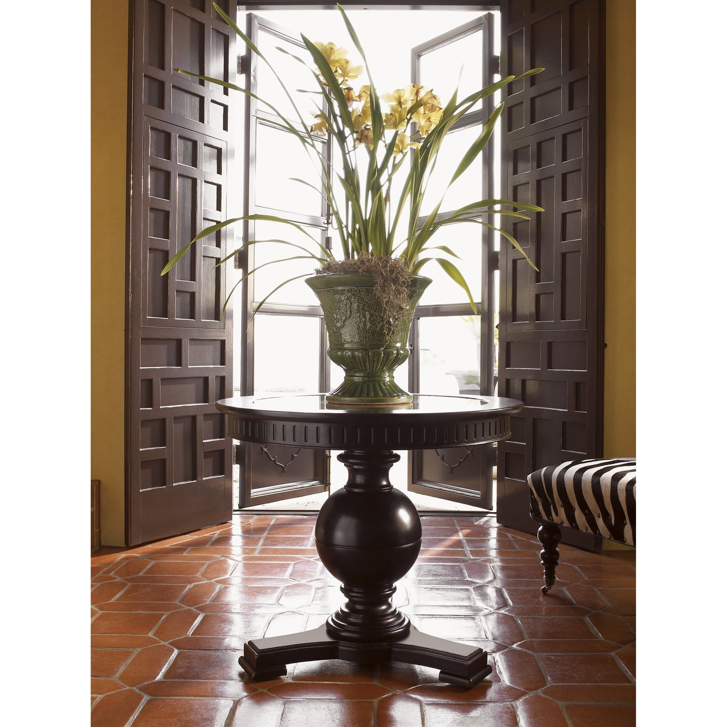 002 SR-836252 | Lifestyle | Marigot Center Table by Tommy Bahama Home in tamarind. Made from unique in a traditional style.