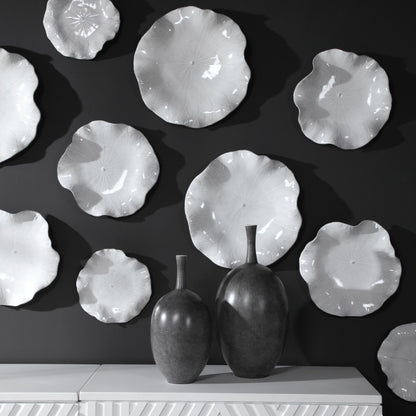 Abella Ceramic Wall Decor by Uttermost. Made from ceramic in a coastal style.