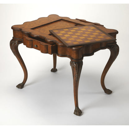 Traditional Game Table by Butler Specialty Company in medium brown and heritage. Made from wood, wood veneer in a traditional style.