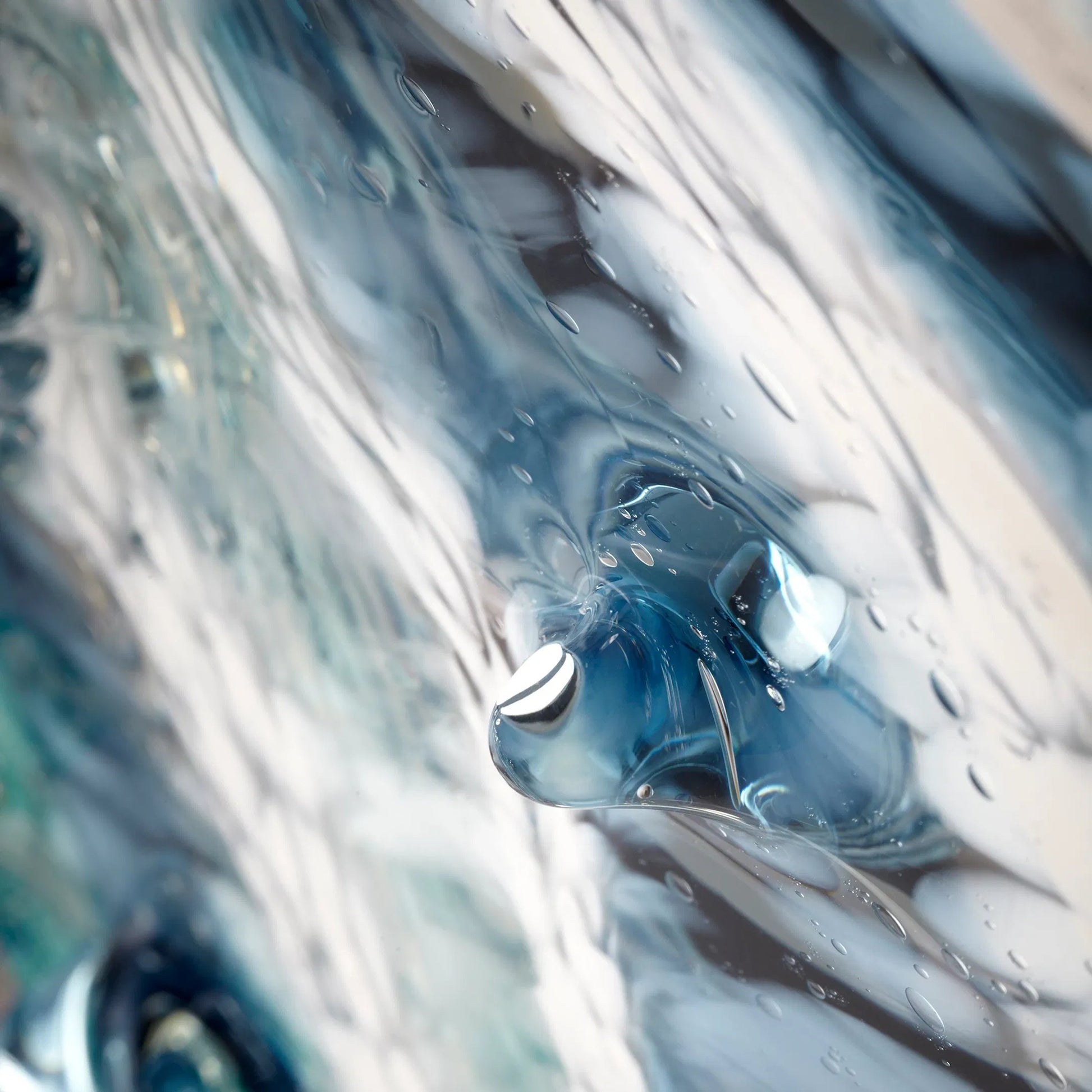 Abyss Plate by Cyan Design in blue, clear. Made from glass in a modern style.