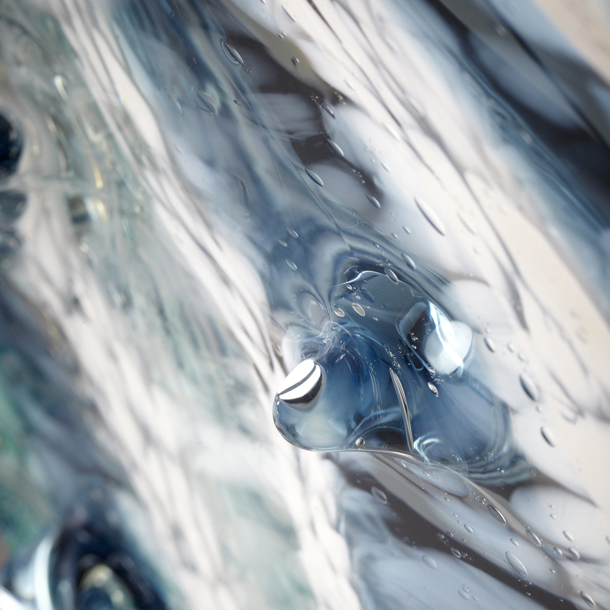 Abyss Plate by Cyan Design in blue, clear. Made from glass in a modern style.