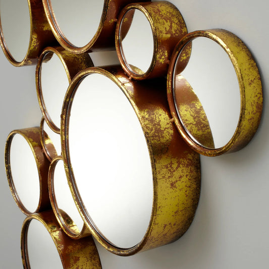 Bubbles Mirror by Cyan Design in gold. Made from iron, mirrored glass in a modern style.