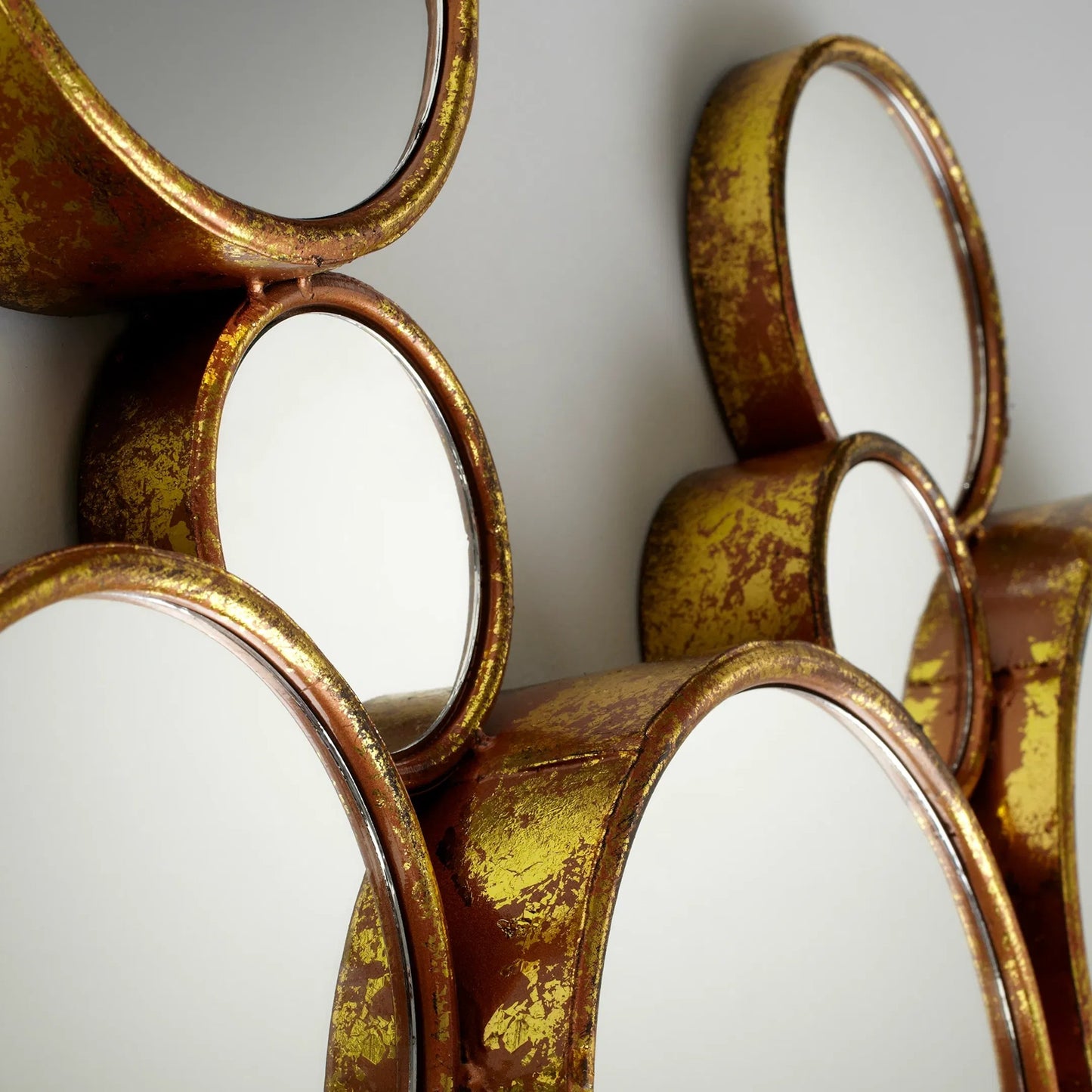 003 S-254827 | Closeup | Bubbles Mirror by Cyan Design in gold. Made from iron, mirrored glass in a modern style.