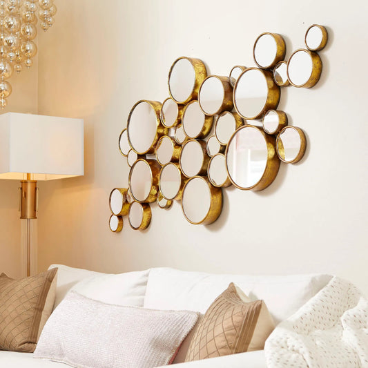 Bubbles Mirror by Cyan Design in gold. Made from iron, mirrored glass in a modern style.