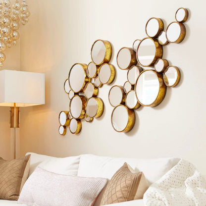 Bubbles Mirror by Cyan Design in gold. Made from iron, mirrored glass in a modern style.